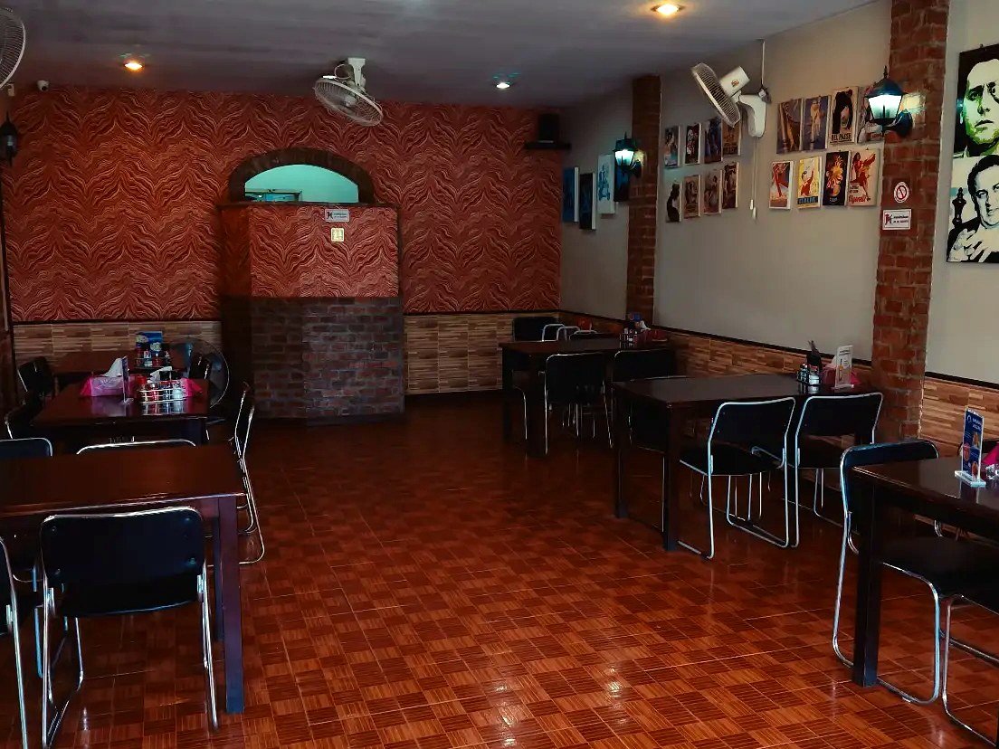 Cozy hidden gem restaurant in Chalong, warm dining room at Agli Amici Phuket